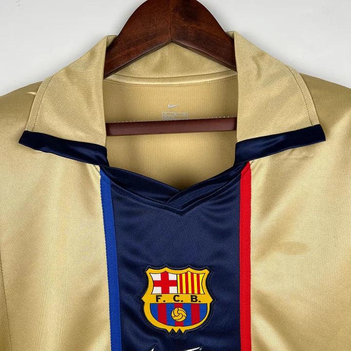 Maillot rétro FC Barcelone 2002 de la marque Le 12 -ème Maillot, vue de face avec logo et design classique.