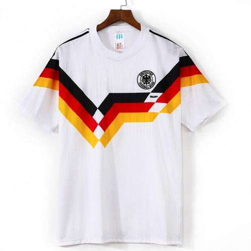 Maillot domicile rétro de l'Allemagne 1990, marque Le 12 -ème Maillot, vue de face avec logo et détails traditionnels.