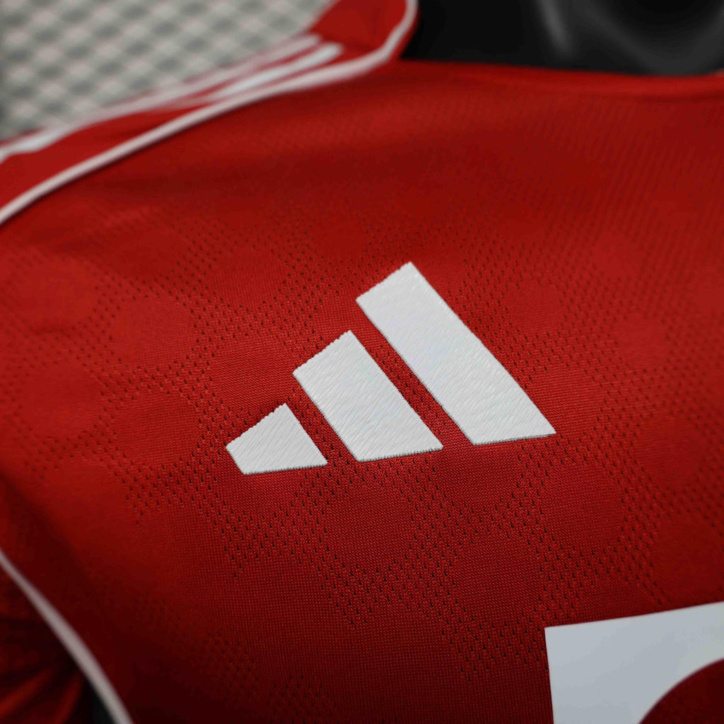 Maillot Bayern Munich 2025-26 Le 12 -ème Maillot, maillot de football avec logo et design officiel visible.