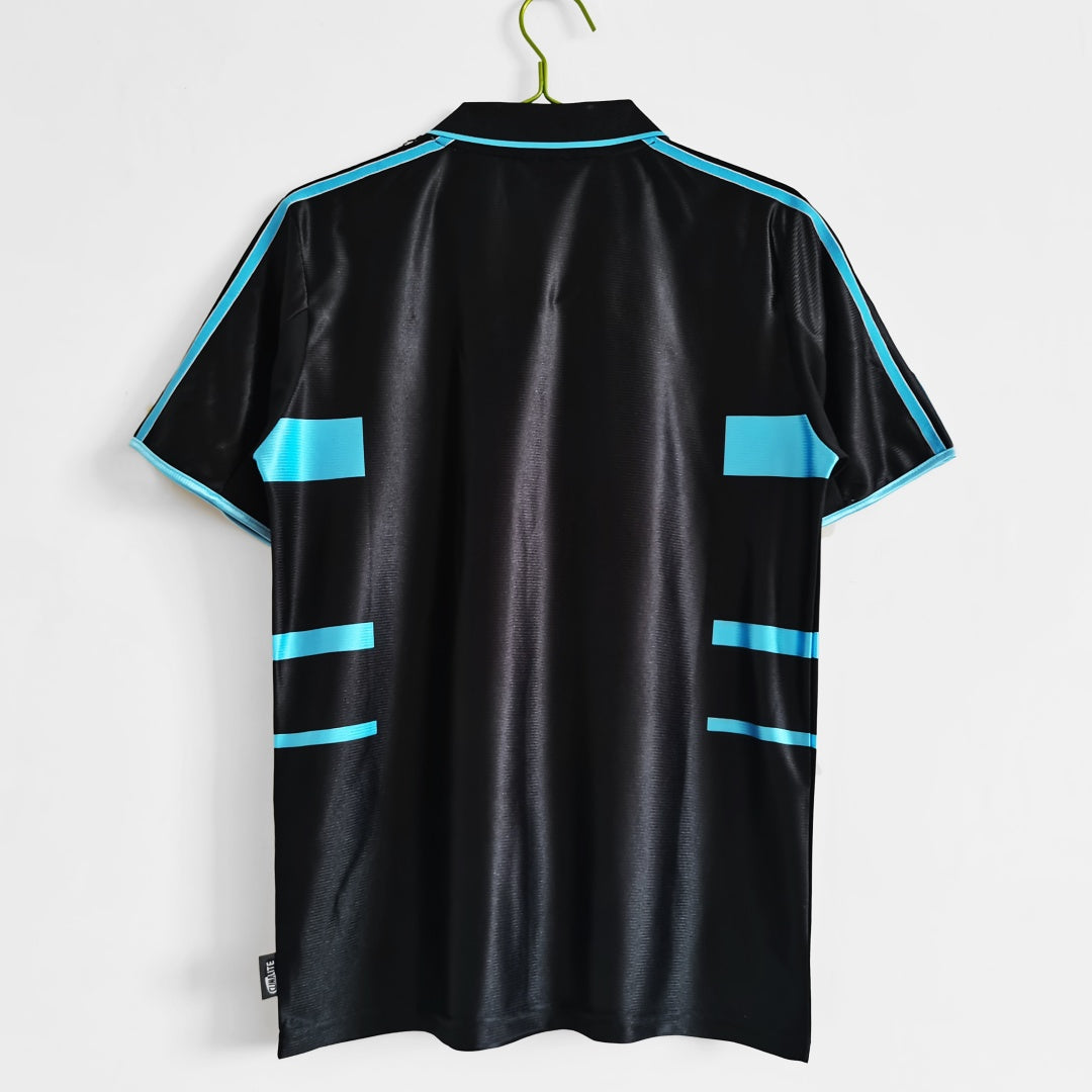 Maillot rétro Marseille 1999-2000, troisième maillot de l'équipe, par Le 12-ème Maillot, vue de face avec logo et design vintage