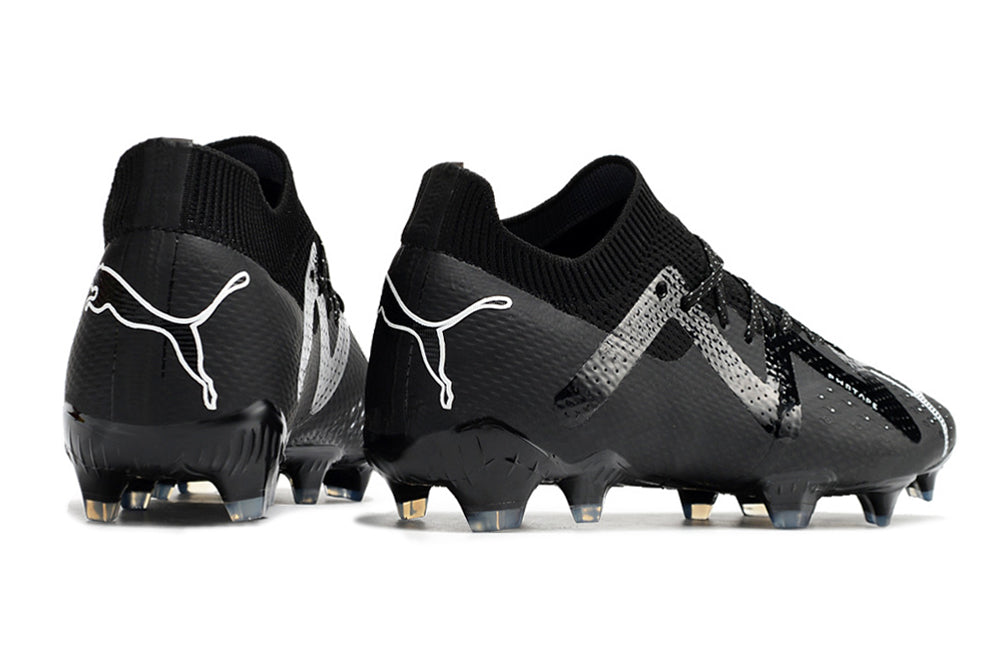 Crampons Ultra Ultimate FG de Le 12 -ème Maillot, avec pointes en acier et semelle robuste pour la pratique du football.