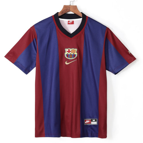 Maillot domicile rétro du FC Barcelone 1998, marque Le 12 -ème Maillot, avec les couleurs traditionnelles blaugrana.