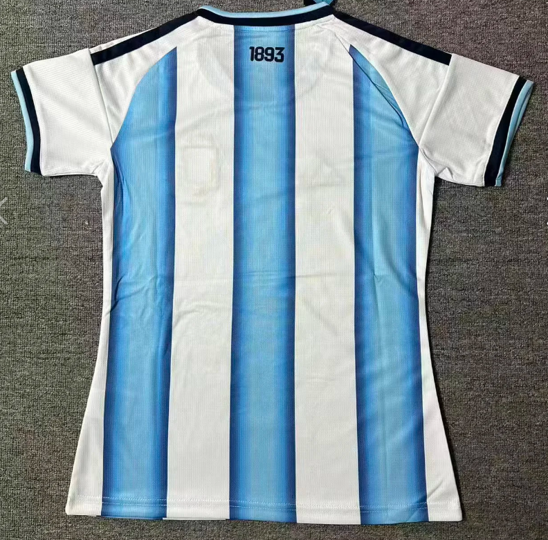 Maillot domicile féminin Argentine 25/26, marque Le 12 -ème Maillot, avec logo et couleurs bleu et blanc.
