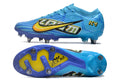 Crampons Mercurial Vapor XV Elite pour football, chaussures de sport avec pointes en acier pour traction optimale.