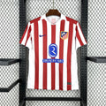 Maillot Atlético Madrid 2025-26 Le 12-ème Maillot, jersey de football rouge avec logo du club et détails en bleu.