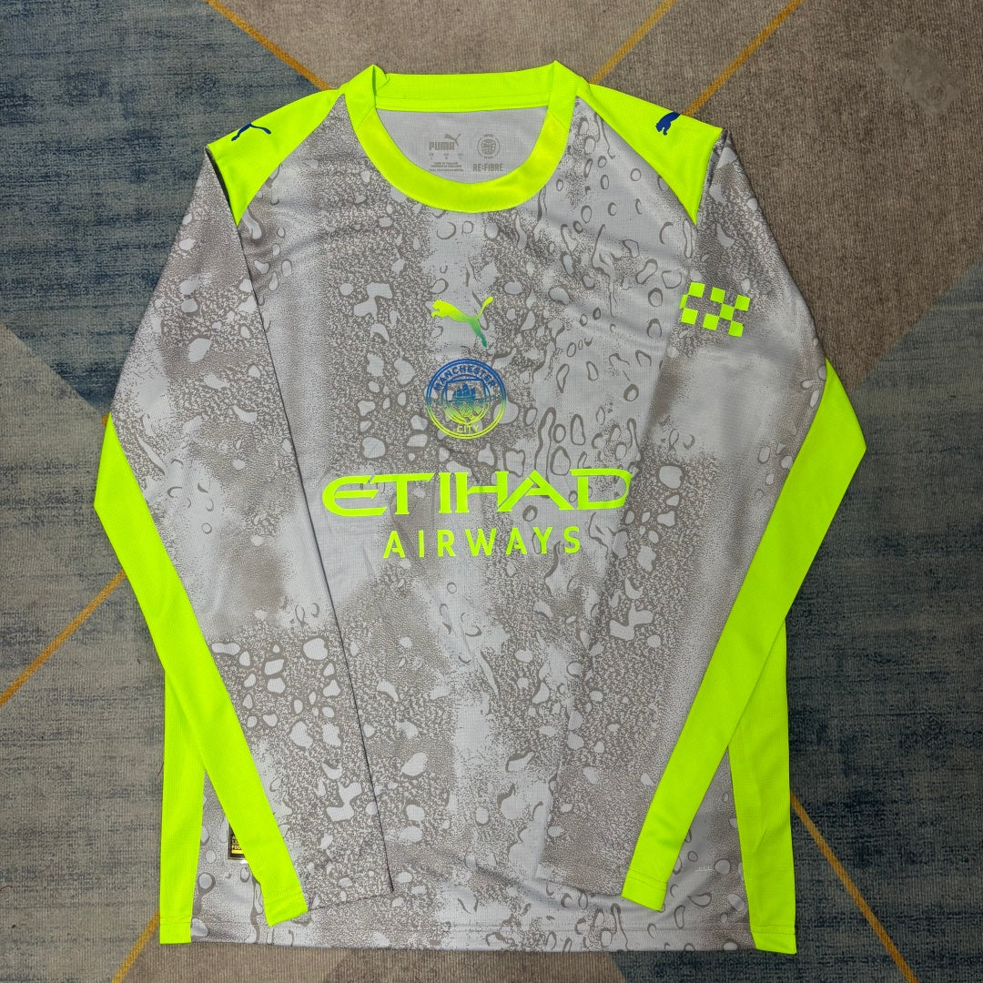 Maillot Manchester City 25/26 à manches longues, troisième maillot de football, marque Le 12 -ème Maillot, design bleu.