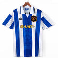 Maillot Manchester United Third Retro 1994-1996, blanc avec détails rouges, logo de l'équipe et design vintage, par Le 12 -ème Maillot