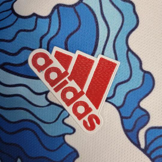 Maillot Japon édition spéciale 2022-23 de Le 12, maillot de football avec logo et design unique, vue frontale.