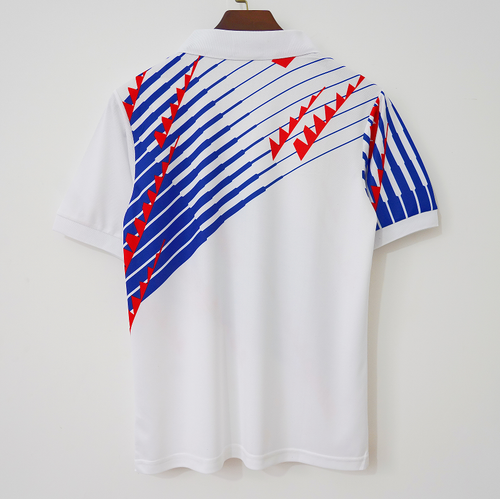 Maillot extérieur rétro 1994 du Japon, marque Le 12ème Maillot, avec design vintage et couleurs traditionnelles.