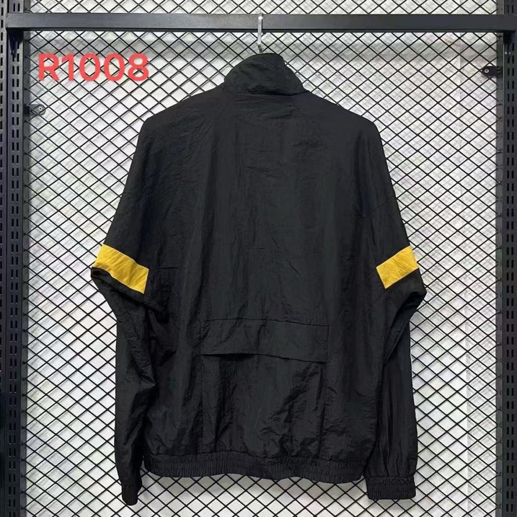 Veste coupe-vent réversible Le 12 -ème Maillot Allemagne, légère et résistante, avec design contrasté visible sur le devant.