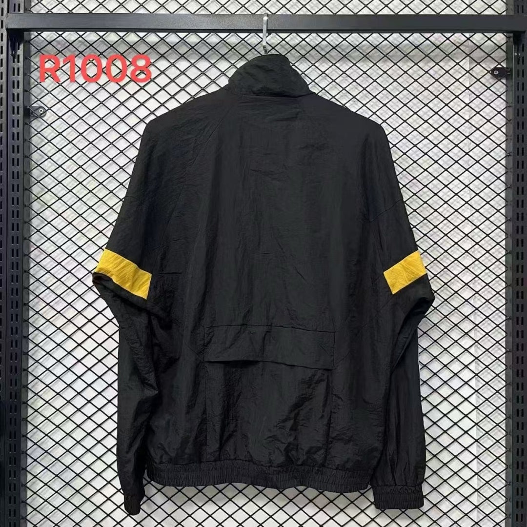 Veste coupe-vent réversible Le 12 -ème Maillot Allemagne, légère et résistante, avec design contrasté visible sur le devant.
