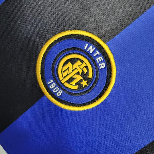 Maillot rétro de l'Inter Milan 1999-2000, marque Le 12-ème Maillot, vue de devant avec logo et détails du design.