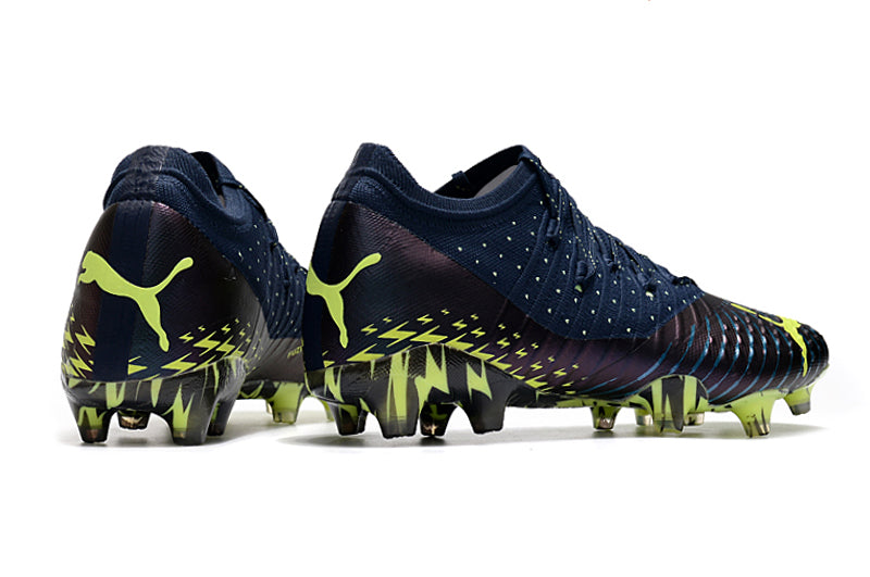 Crampons Future Z 1.3 Teazer FG de Le 12 -ème Maillot, spikes en acier, pour football en extérieur, fixation solide et performance.