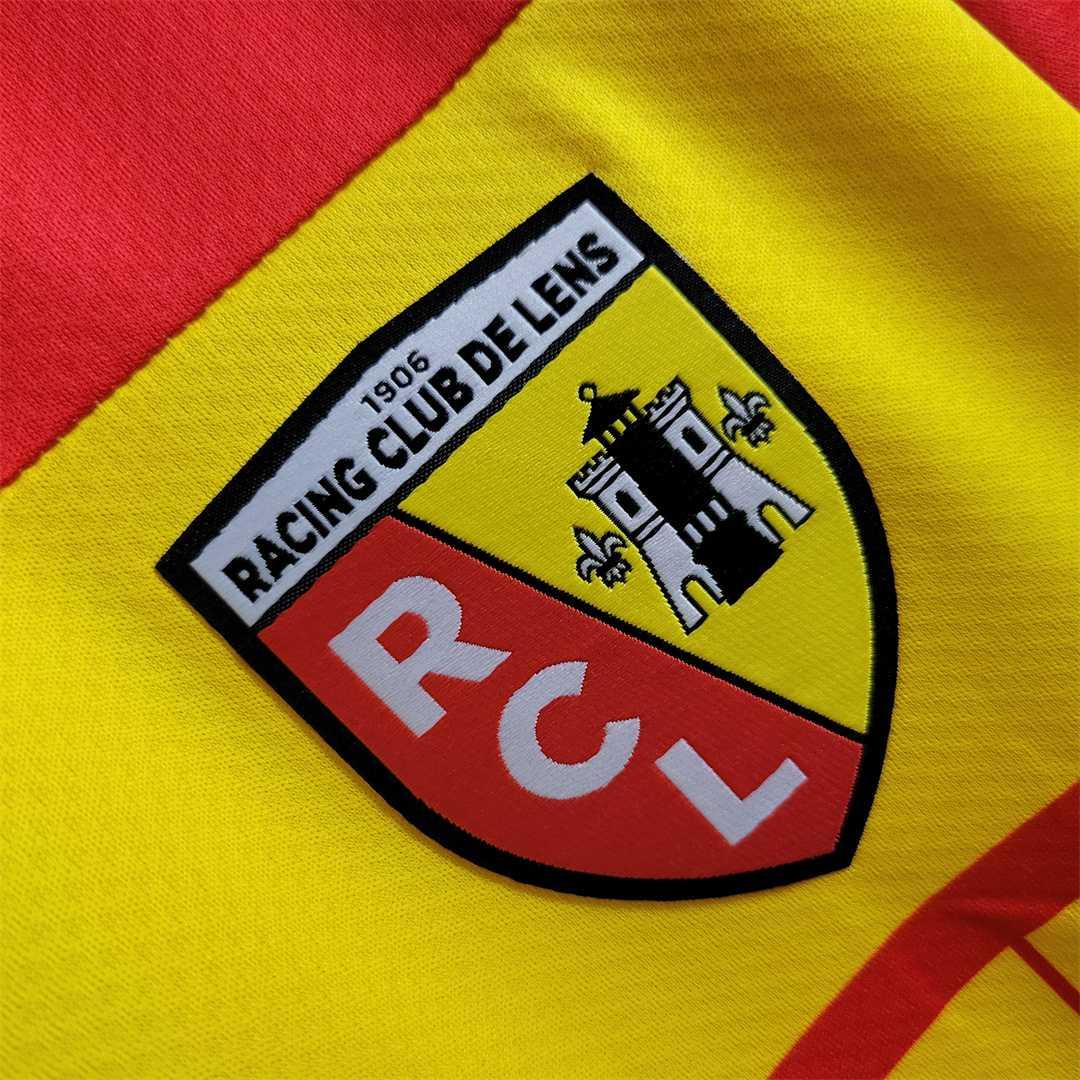 Maillot Le 12 -ème Maillot Lens 2022-23, maillot de football avec logo et design officiel, porté par un joueur.