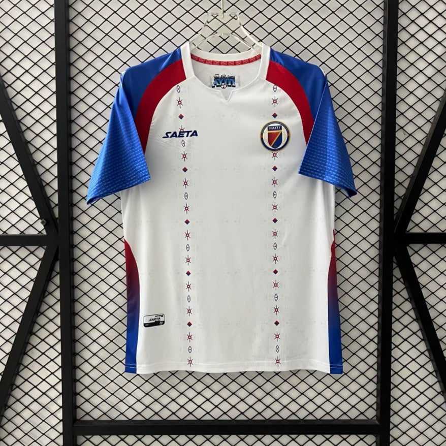 Maillot de football extérieur Haiti 25/26 Le 12-ème Maillot, jersey bleu avec logo et détails sportifs visibles.