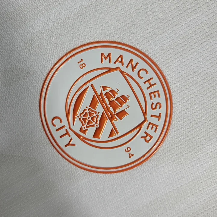 Maillot Manchester City extérieur 2023-2024 Le 12 -ème Maillot, maillot de football avec logo de l'équipe et design officiel.