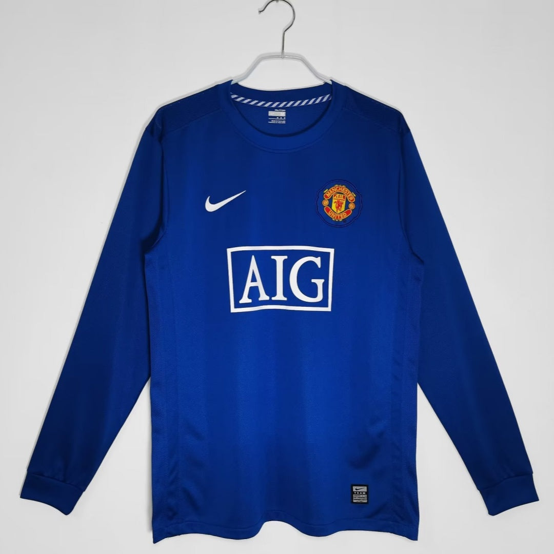Maillot rétro Manchester United third manches longues 2007-2008, édition Le 12-ème Maillot, détail du design vintage.