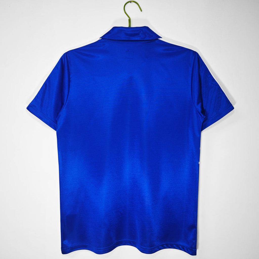 Maillot rétro France Domicile 1984 de la marque Le 12 -ème Maillot, vue de face avec logo et design vintage.