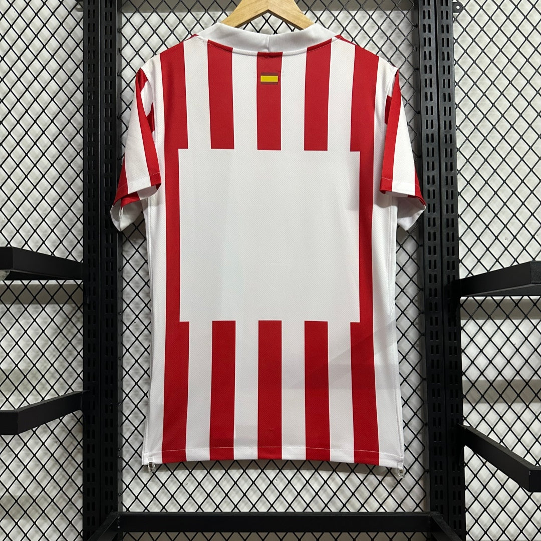 Maillot domicile Atlético Madrid 25/26 de Le 12-ème Maillot, maillot de football rouge avec logo et détails officiels.