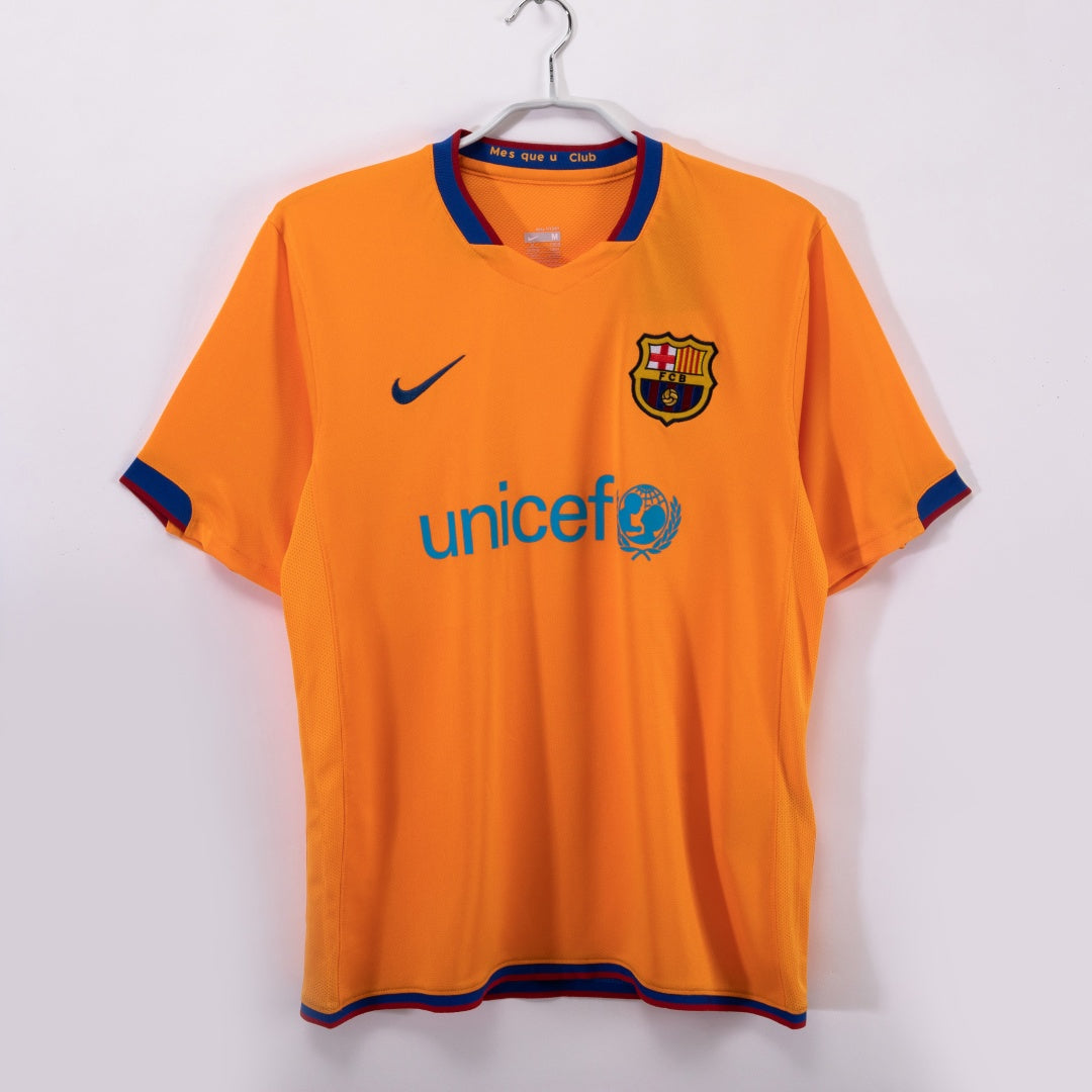 Maillot extérieur rétro du FC Barcelone 2006-2007, marque Le 12, vue de face avec logo et détails du maillot.