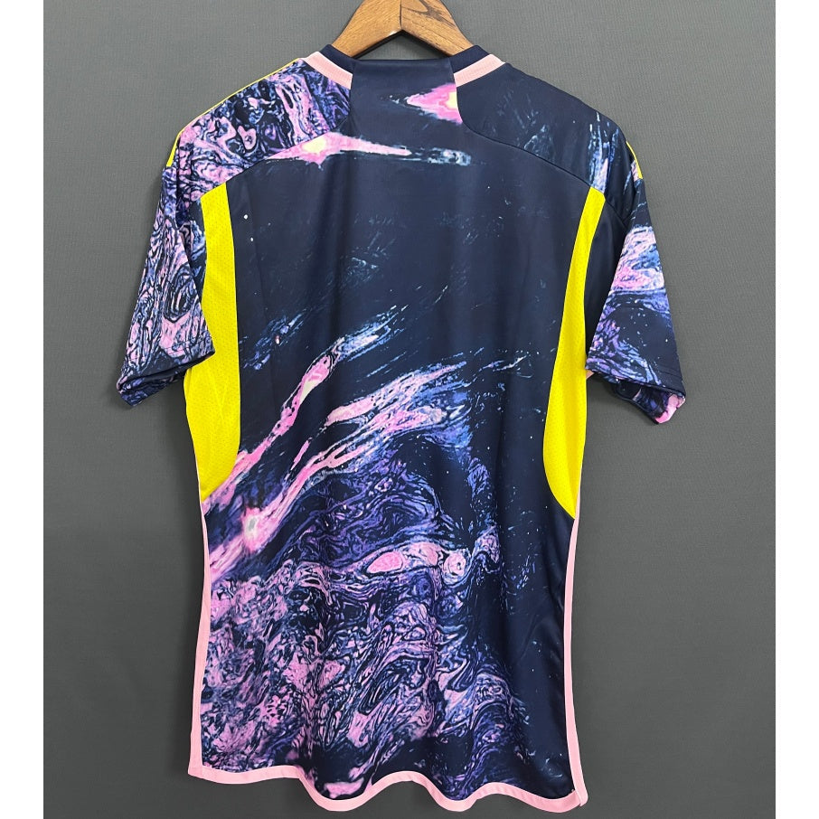 Maillot cycliste pour enfants 25/26 Colombie, marque Le 12, avec design coloré et logo de l'équipe sur le front et le dos.