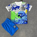 Ensemble enfant Brésil Spécial 25/26 de la marque Le 12 -ème Maillot, maillot de football avec motif oiseau bleu.