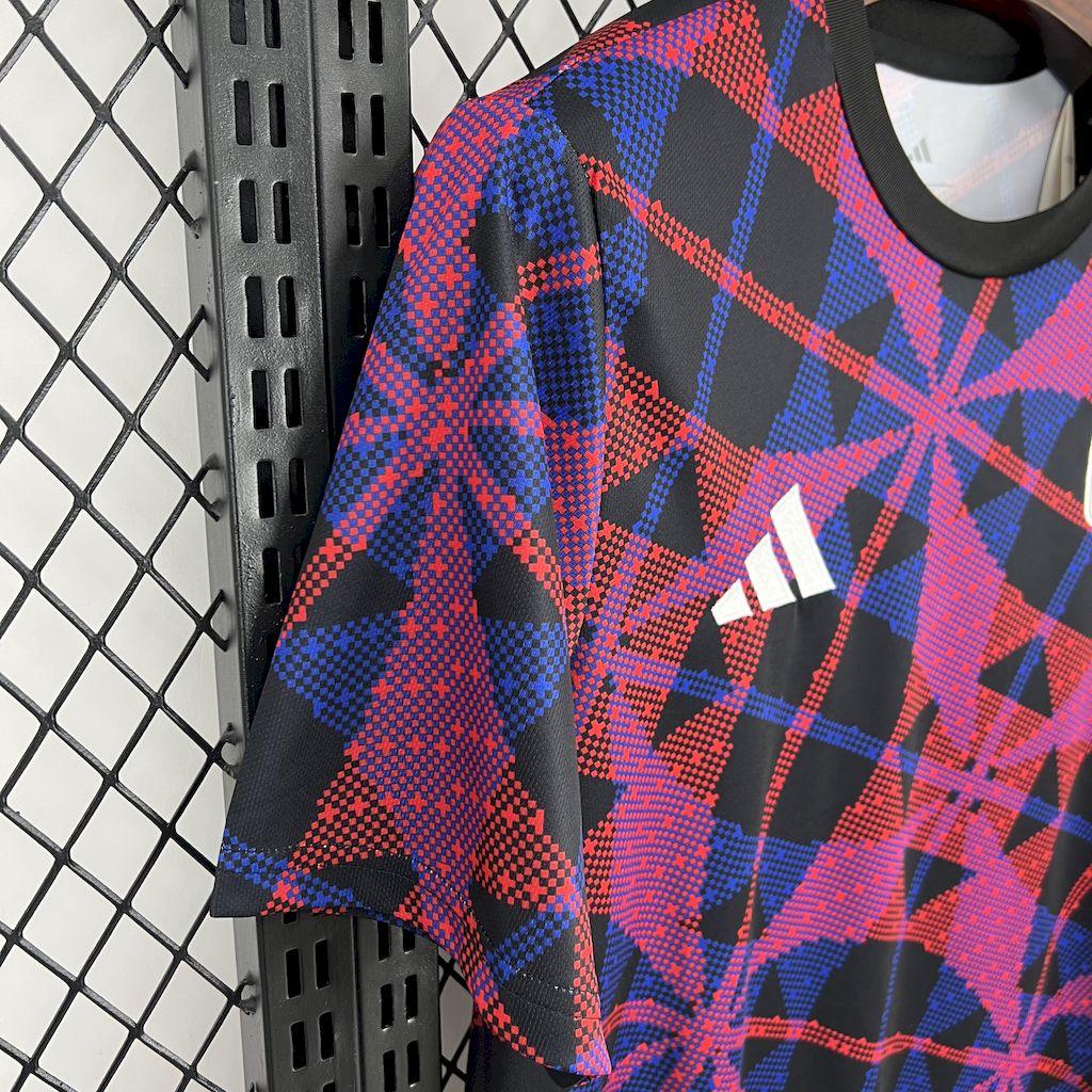 Maillot d'entraînement Lyon 2025-26 de la marque Le 12 -ème, devant avec logo et détails en bleu et blanc.