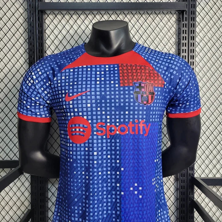 Maillot d'entraînement FC Barcelone 2023-2024 Le 12ème Maillot, maillot de sport avec logo du club et design moderne.