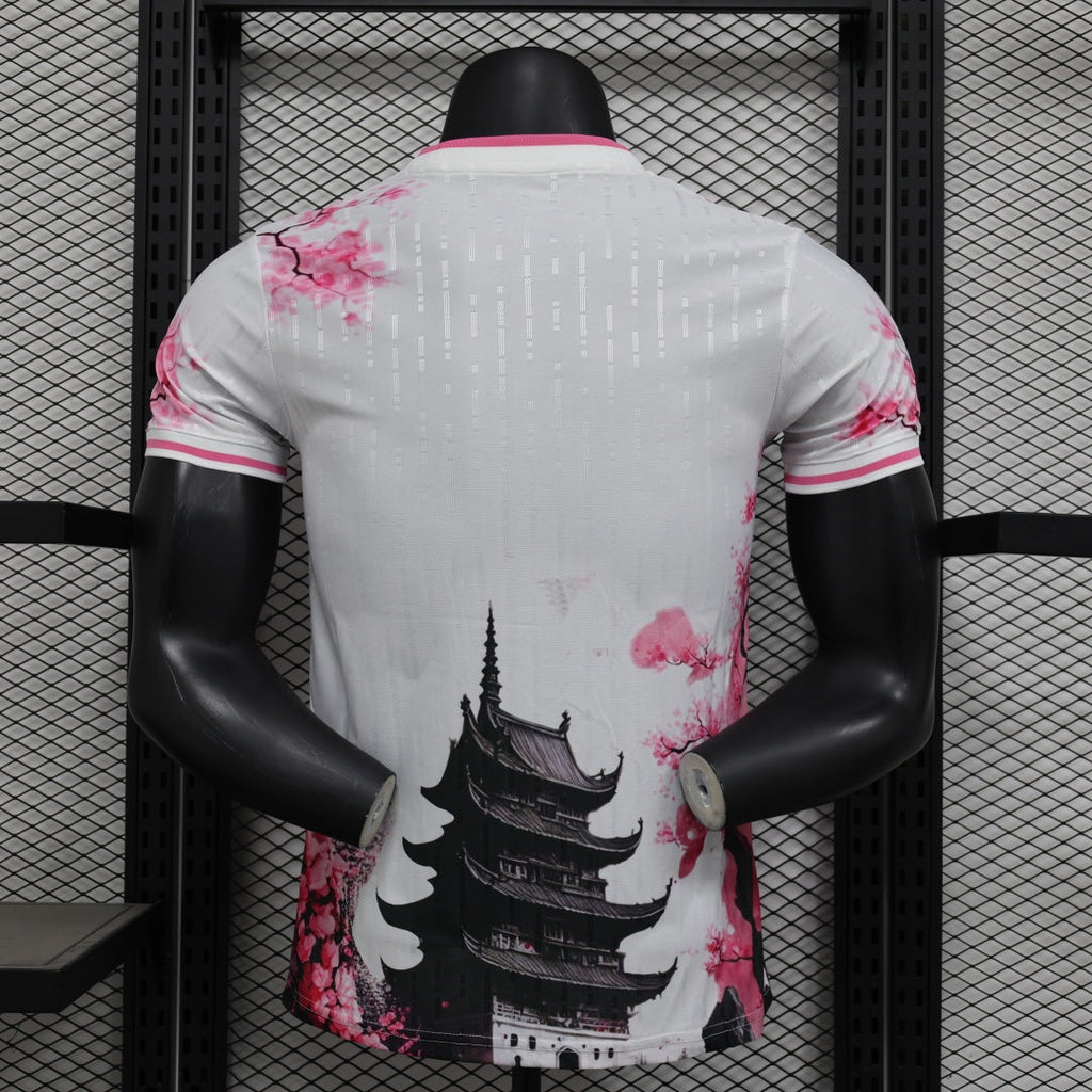 Maillot de football Le 12 -ème Maillot, taille 25/26, modèle Japon spécial joueur D, avec logo et détails colorés.