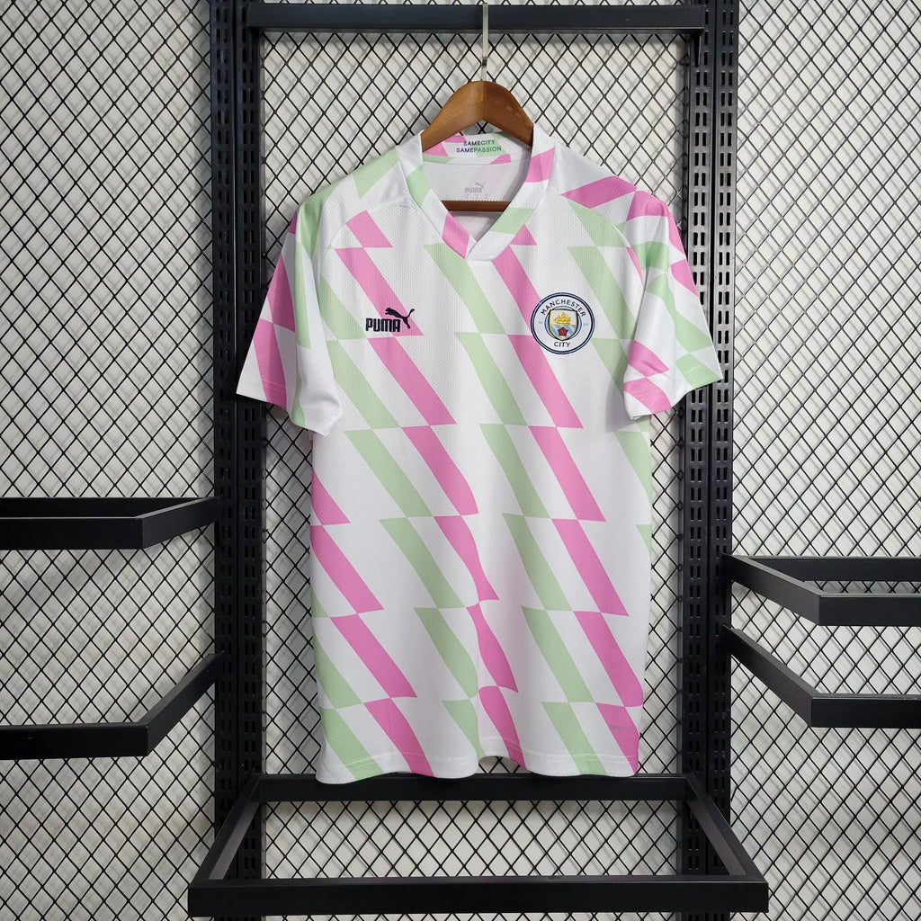 Maillot d'entraînement Manchester City 2023 2024 Le 12 -ème Maillot, maillot de football bleu avec logo de Manchester City.