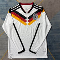 Maillot de football à manches longues Allemagne domicile 2025/26, marque Le 12, vue de face avec design officiel.