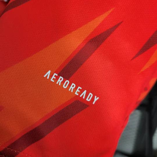 Maillot d'entraînement Arsenal 2023-2024 Le 12 -ème Maillot, vue de face avec logo et design sportif.