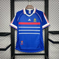Maillot de football France saison 1998 rétro, jersey Le 12 -ème Maillot, vue de face avec détails du design vintage.
