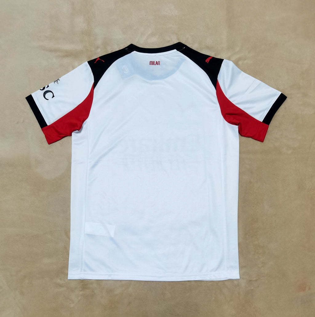Maillot extérieur AC Milan 25/26 Le 12ème Maillot, maillot de football avec logo et détails en bleu et noir.