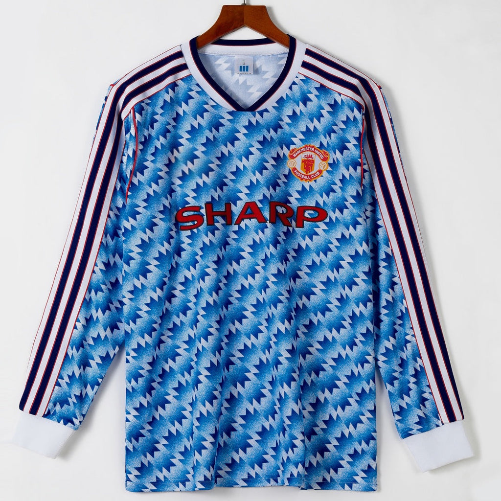 Maillot extérieur rétro Manchester United 1990-1992 à manches longues, marque Le 12 -ème Maillot, vue de face.