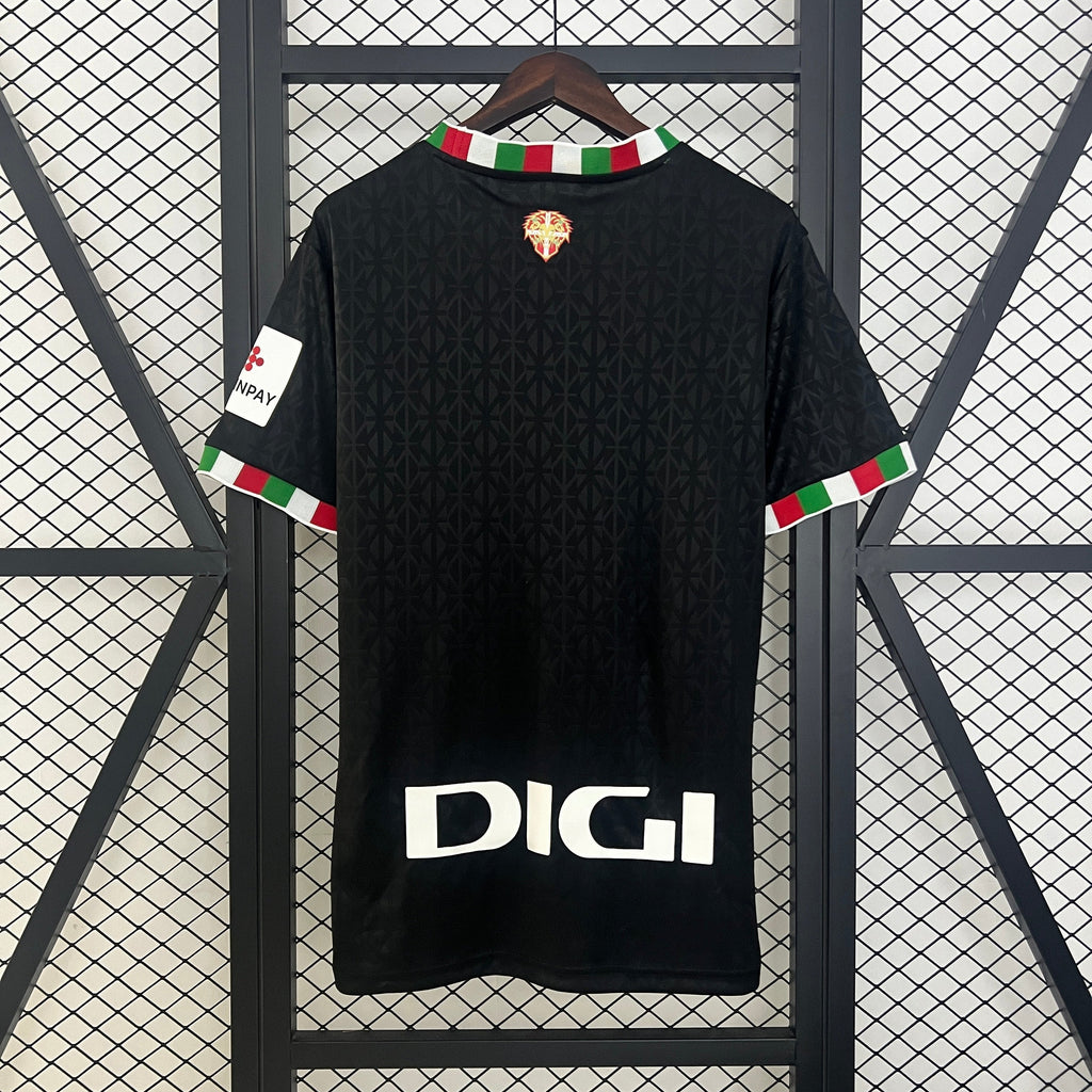 Maillot de football Athletic Bilbao quatrième, marque Le 12 -ème Maillot, en tissu bleu avec logo et détails noirs.