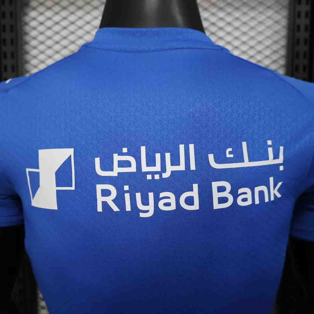 Maillot de football Al Hilal 2025-26, marque Le 12 -ème Maillot, vue de face avec logo et détails du maillot.