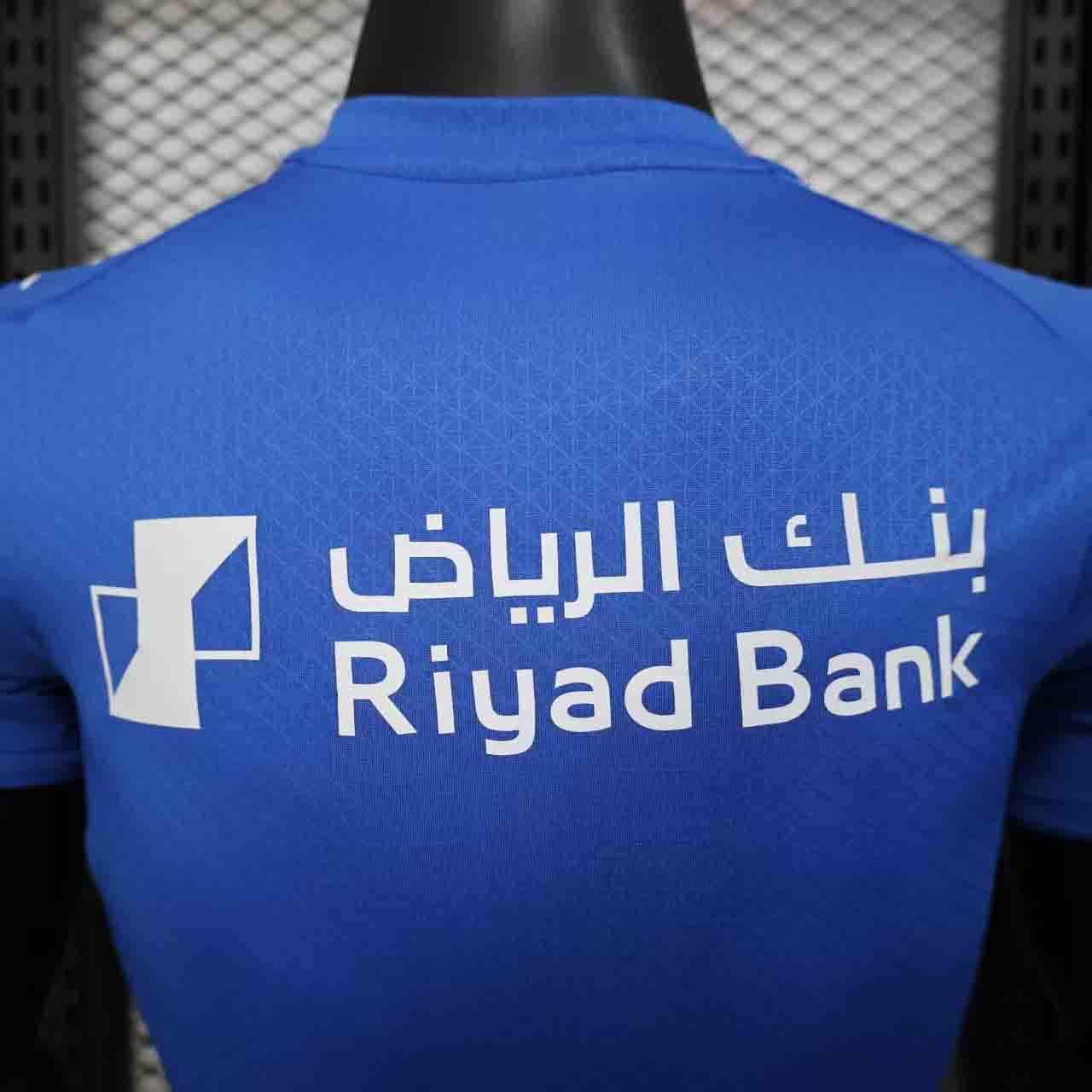Maillot de football Al Hilal 2025-26, marque Le 12 -ème Maillot, vue de face avec logo et détails du maillot.