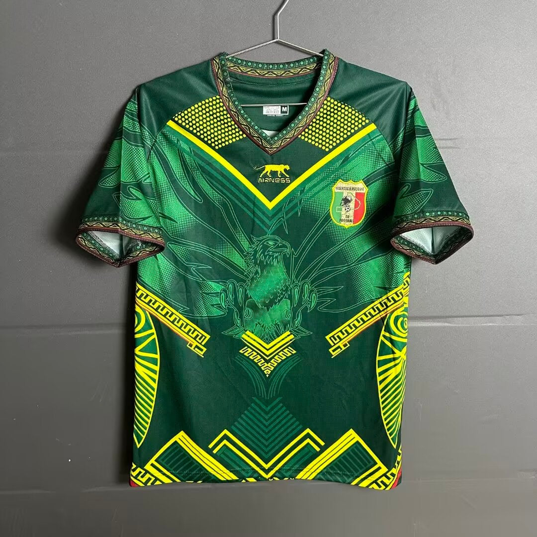 Maillot extérieur Mali 25/26 de la marque Le 12 -ème Maillot, vue de face avec logo et couleurs vives.