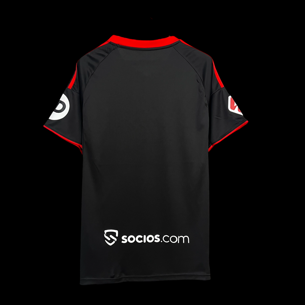 Maillot de football Le 12 -ème Maillot Seville Third 25/26, maillot orange avec logo de l'équipe et détails de design.