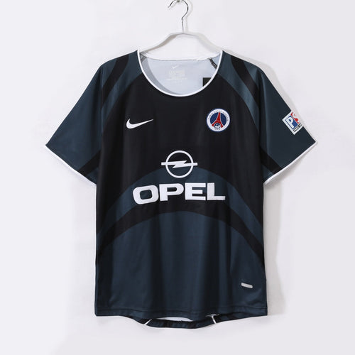 Maillot rétro PSG troisième 2001-2002 Le 12-ème Maillot, maillot de football bleu avec logo du club et détails vintage.