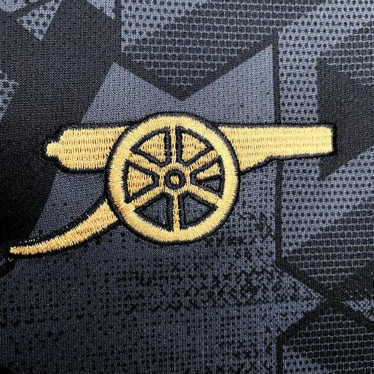 Maillot extérieur Arsenal 2022-2023 noir, Le 12 -ème Maillot, avec logo et design sportif visible.