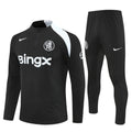 Ensemble Chelsea noir pour enfants de la marque Le 12 -ème Maillot, comprenant des bottines noires élégantes et confortables.