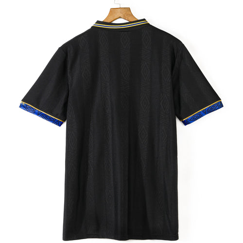 Maillot extérieur rétro Manchester United 1993-1994, marque Le 12-ème Maillot, vue front avec logo et détails traditionnels.