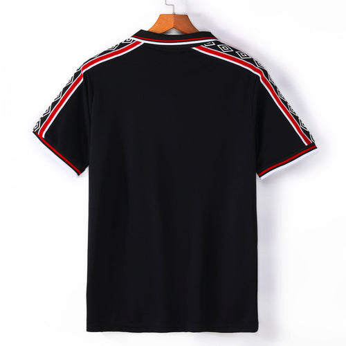Maillot extérieur rétro Manchester United 1998-1999 Le 12-ème Maillot, maillot de football vintage avec logo et détails d'époque.