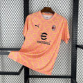 Maillot d'entraînement AC Milan 2025-26, marque Le 12 -ème Maillot, visible avec logo et design sportif.