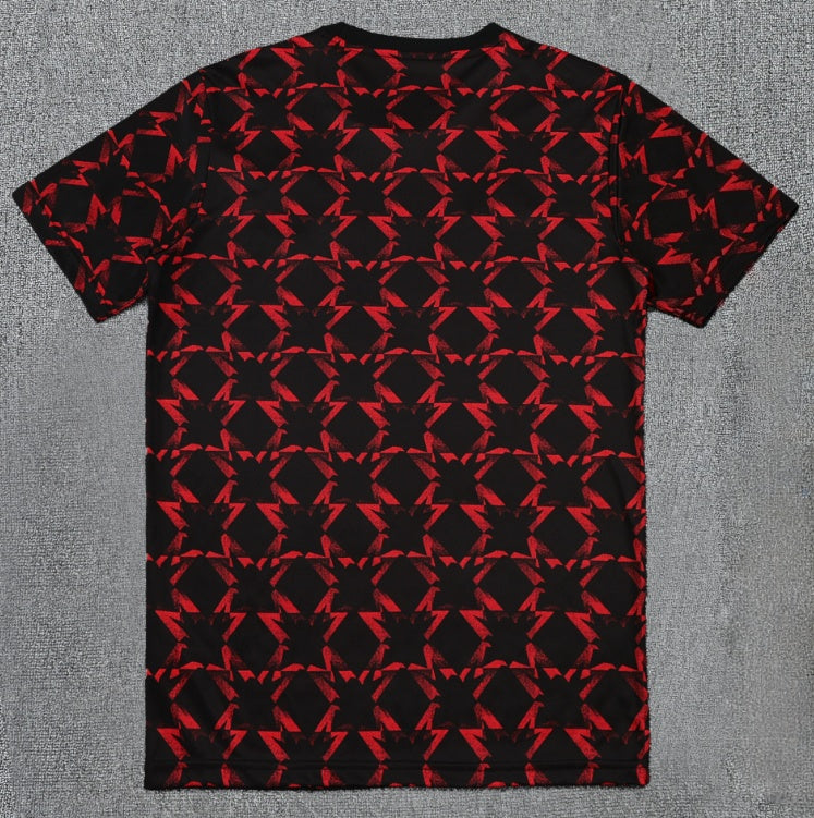 Maillot d'entraînement Manchester United 25/26 de la marque Le 12-ème Maillot, vue de face, logo et détails visibles.
