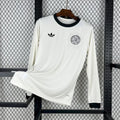 Maillot Allemagne manches longues Le 12 -ème Maillot, design concept 2025, couleurs bleu et noir, vue de face.