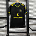 Maillot third Manchester United 2025-2026, marque Le 12-ème Maillot, vue de face avec logo et détails du maillot.