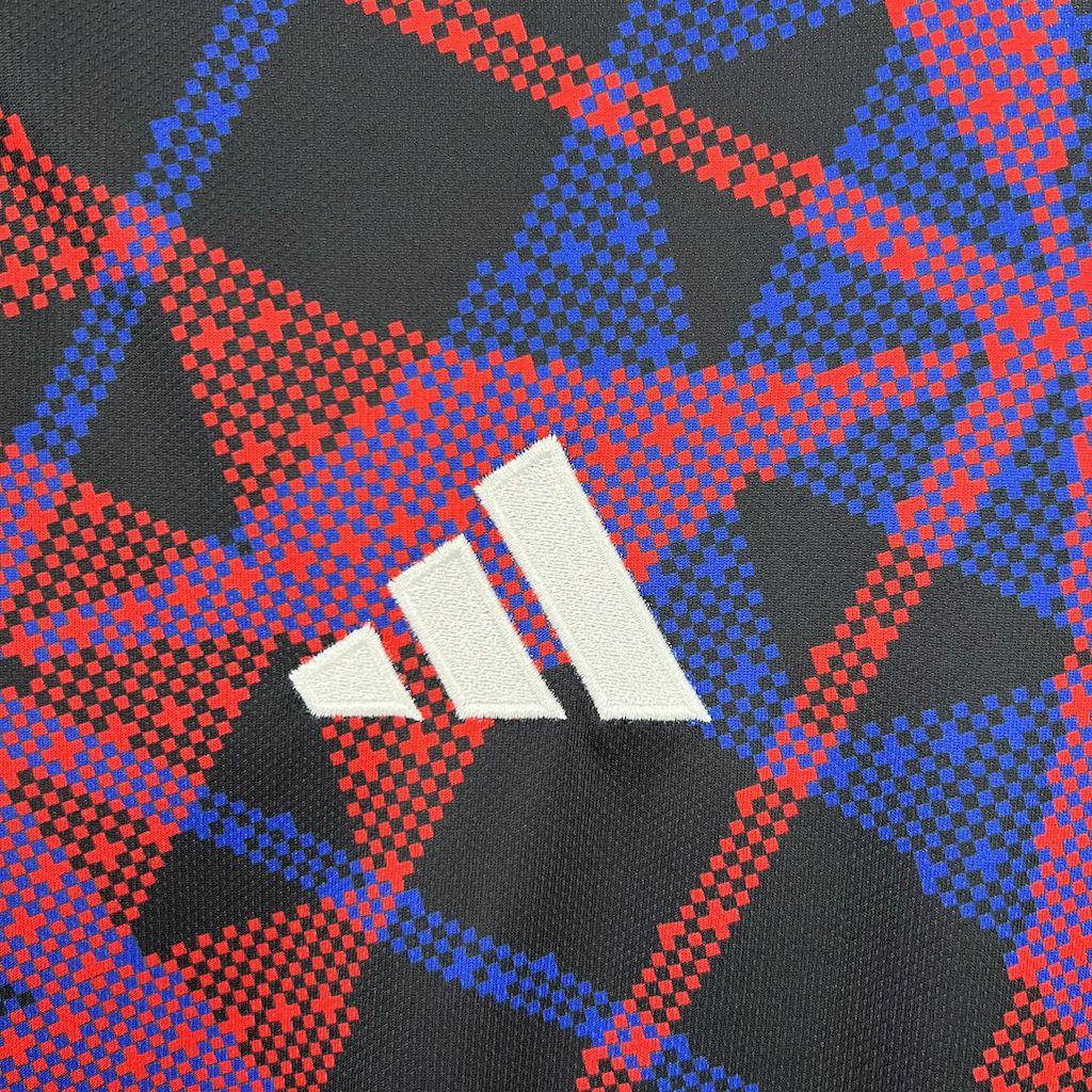 Maillot d'entraînement Lyon 2025-26 de la marque Le 12 -ème Maillot, vue de face avec logo et détails sportifs.